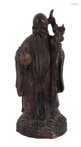 A CHINESE CARVED HARDWOOD FIGURE OF SHOULAO, QING DYNASTY