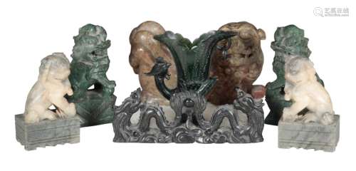 A PAIR OF CHINESE CARVED JADEITE DOGS OF FOO