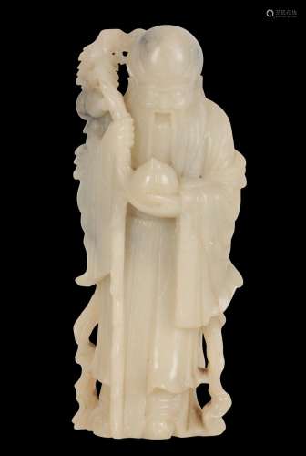 A CHINESE JADEITE FIGURE OF AN IMMORTAL