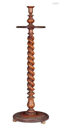 A WALNUT TORCHERE