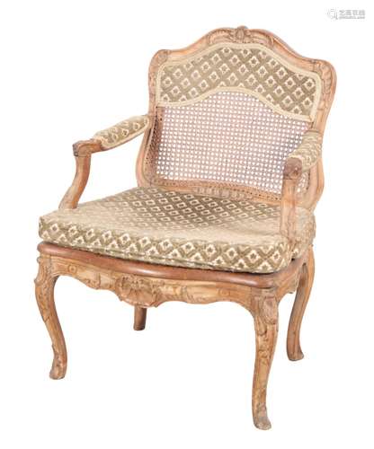 A LOUIS XV BEECH WOOD FAUTEUIL