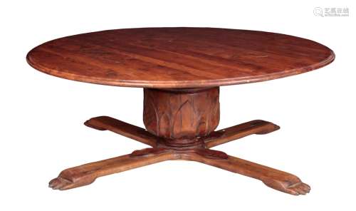 A YEW WOOD CIRCULAR DINING TABLE