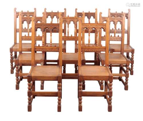 A SET OF TEN OAK HIGH BACK DINING CHAIRS