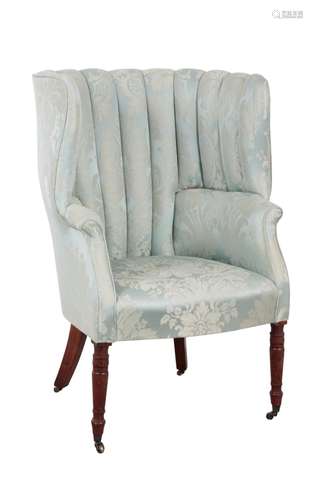 AN EARLY 19TH CENTURY BARREL BACK ARMCHAIR