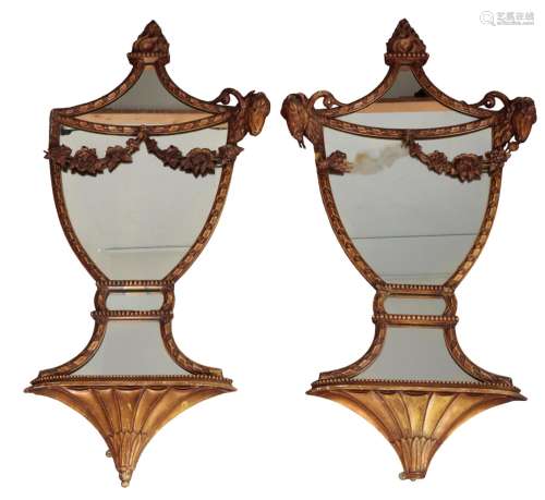 A PAIR OF REGENCY STYLE GILTWOOD AND COMPOSITION URN SHAPED ...