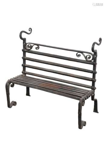 A WROUGHT IRON GRATE