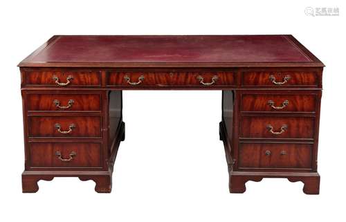 A GEORGE III STYLE MAHOGANY PARTNERS DESK BY BERESFORD &...