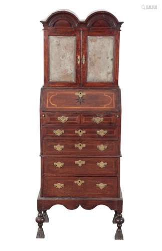 AN EARLY 18TH CENTURY STYLE OAK BUREAU ON STAND OF SMALL PRO...