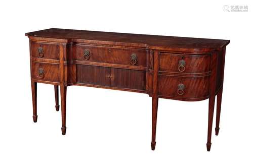 A GEORGE III MAHOGANY BREAKFRONT SIDEBOARD