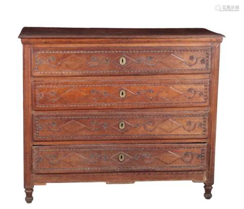 AN 18TH CENTURY FRENCH OAK CHEST OF DRAWERS