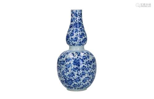A blue and white porcelain gourd vase