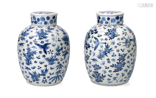 A pair of blue and white porcelain lidded jars