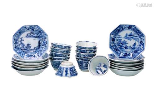 A set of 12 octagonal blue and white porcelain cups with sau...