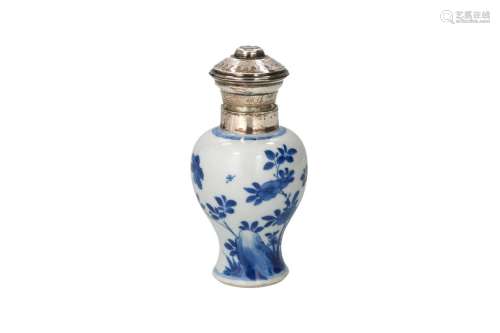 A blue and white porcelain tea caddy with silver cap and mou...