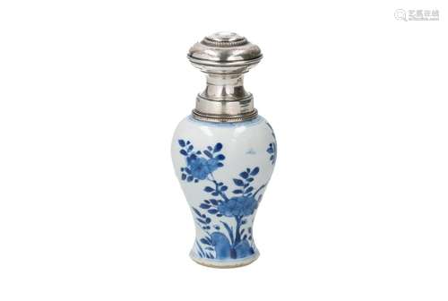 A blue and white porcelain tea caddy with silver cap and mou...