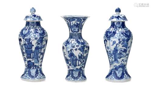 A set of one blue and white porcelain lobed vase and two sim...