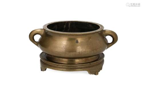 A bronze censer with two handles