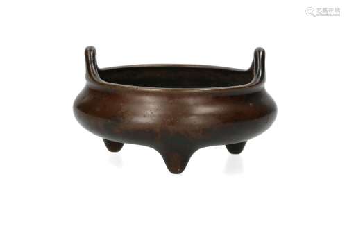 A bronze tripod censer with two handles