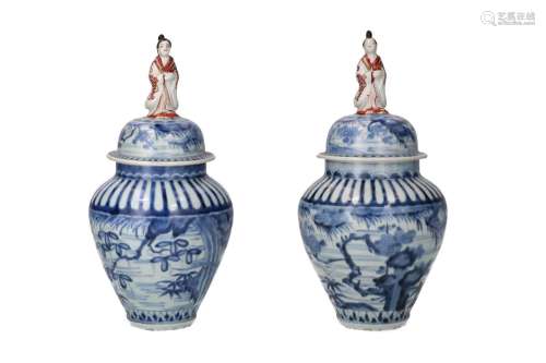 A pair of blue and white porcelain lidded jars
