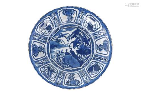 A blue and white 'kraak' porcelain deep charger with scallop...