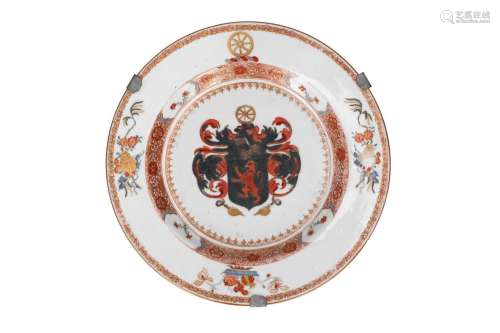 A polychrome porcelain armorial dish with a coat of arms