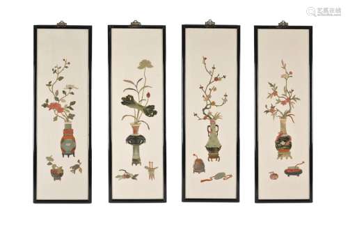 A set of four lacquer panels