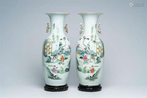 A pair of Chinese famille rose vases with playing children a...