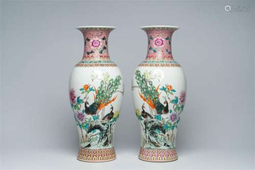 A pair of Chinese famille rose baluster vases with peacocks ...