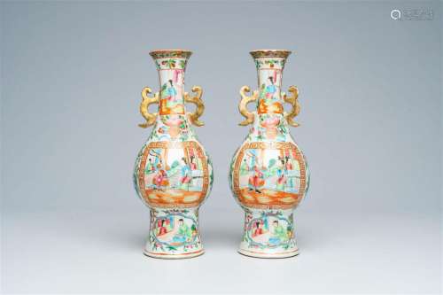 A pair of Chinese Canton famille rose vases and with palace ...