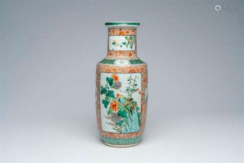 A Chinese famille verte vase with birds among blossoming bra...