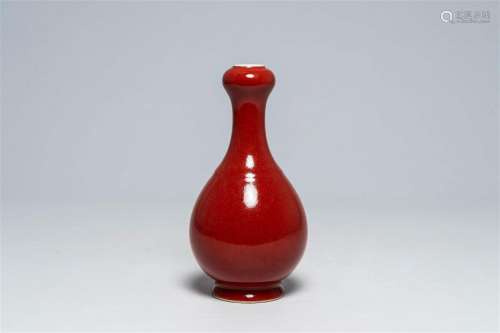 A Chinese monochrome copper red garlic head vase, Qianlong m...