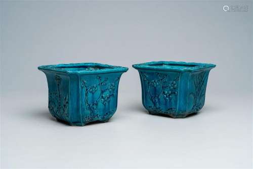 A pair of Chinese monochrome turquoise jardinières with flor...