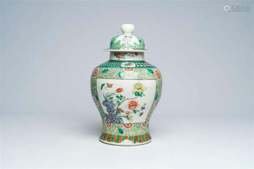 A Chinese famille verte vase and cover with floral design, 1...