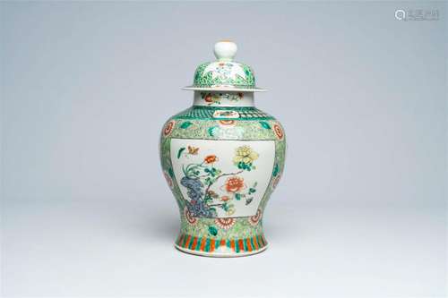 A Chinese famille verte vase and cover with floral design, 1...