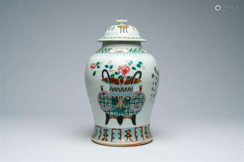 A Chinese famille rose vase and cover with antiquities and f...