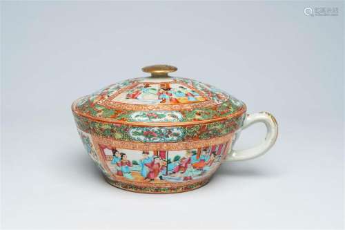 A Chinese Canton famille rose chamber pot with palace scenes...