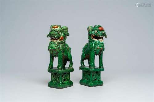 Two Chinese green-glazed earthenware temple lions, 18th/19th...
