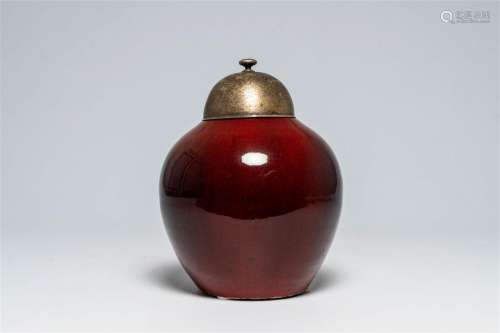 A Chinese monochrome flambé glazed jar with metal cover, 19t...