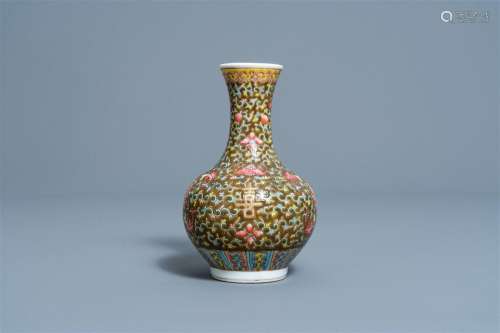 A Chinese famille rose brown ground vase with floral design,...