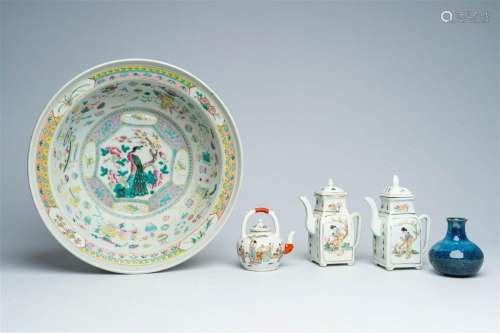 A Chinese famille rose bowl with a bird among blossoming bra...