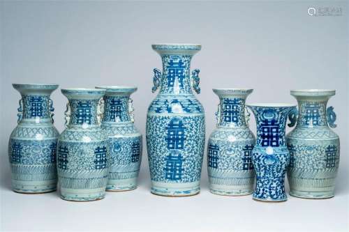 Seven Chinese blue and white 'double happiness' vases, 19th/...