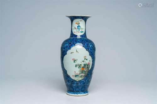 A Chinese famille rose vase with birds among blossoming bran...