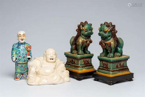 A Chinese blanc de Chine figure of Buddha, a pair of sancai ...