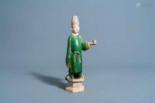 A Chinese sancai glazed figure of a dignitary, Ming or later