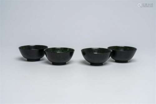 Four Chinese dark green jade bowls, 19th/20th C.