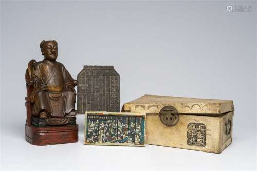 A Chinese polychrome wood sculpture, a collection of printin...