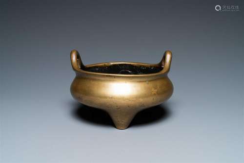 A Chinese bronze tripod censer, Xuande mark, 19th C.