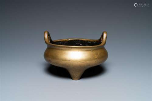 A Chinese bronze tripod censer, Xuande mark, 19th C.