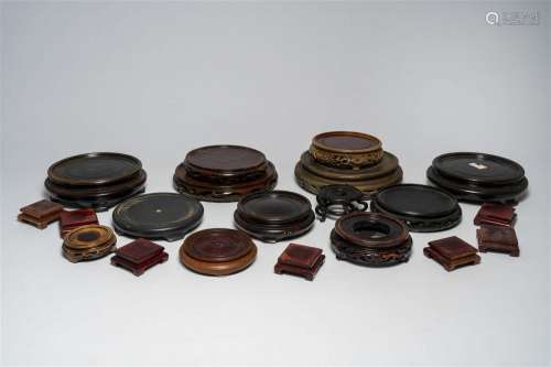A varied collection of Chinese carved wood stands, 19th/20th...