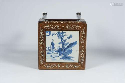 A Chinese mother-of-pearl-inlaid wooden stand with blue and ...